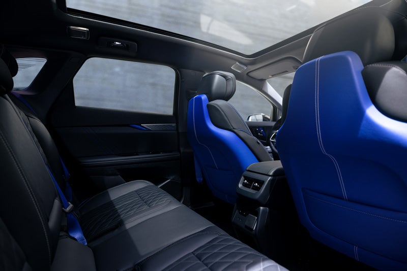 Back Seat View of the 2026 OPTIQ-V Blue Front Seats, Sun Roof, and Interior | Dan Vaden Chevrolet Savannah in Savannah GA